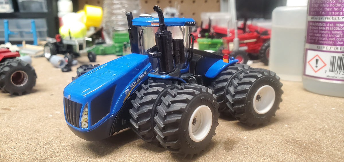 Details about   1/64 ERTL NEW HOLLAND T9.700 4WD TRACTOR W/ DUALS 