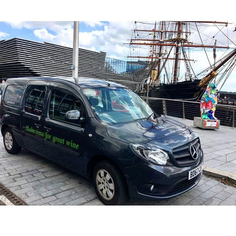 The Aitkens van delivering to Discovery Point infront of the new V & A Museum
