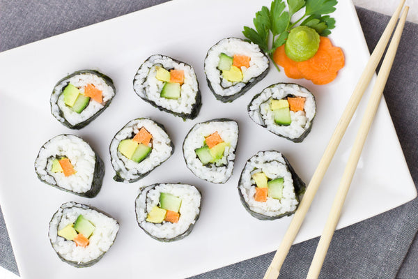 Delicious sushi and vegetable rice rolls - vegan
