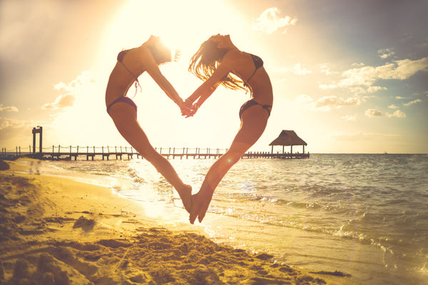 Women With love Heart on the beach