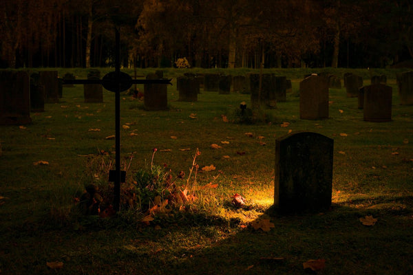 Dimly Lit Graves At Night - Naturally Wicked