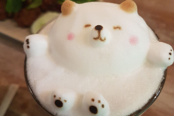 Cafe Latte with bear shaped from foamed milk