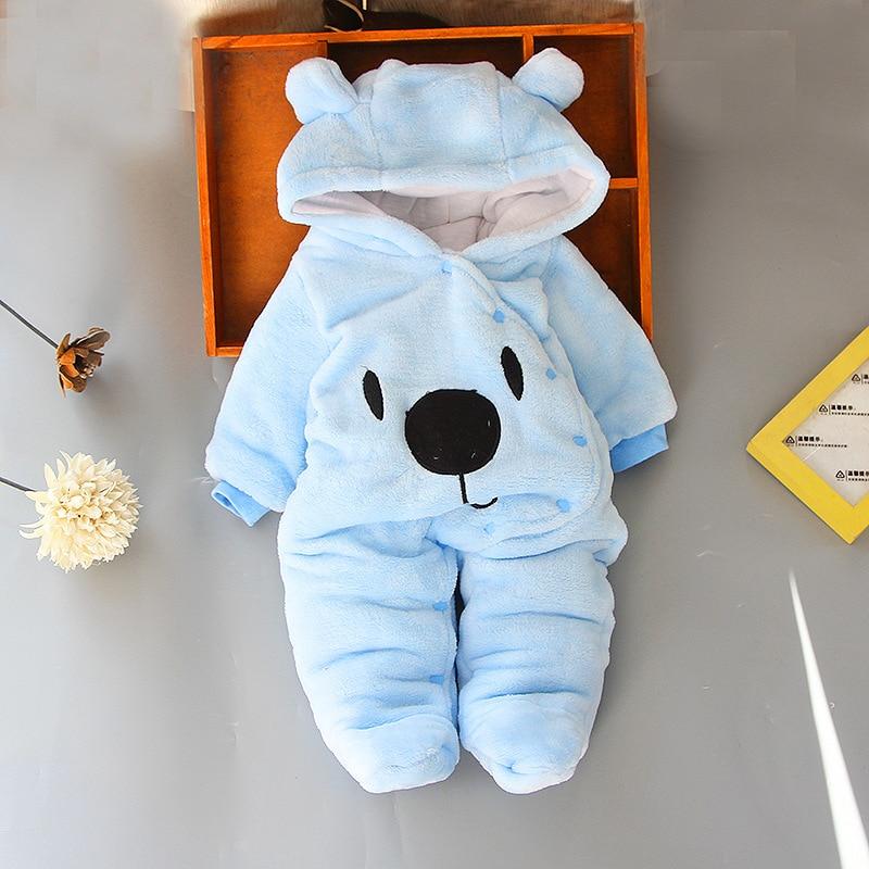teddy bear with baby clothes