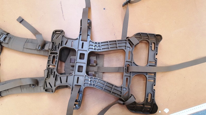 Attach top and bottom shoulder pad attachment points to the frame.