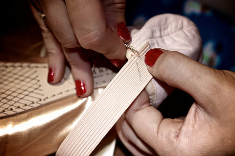 Sewing elastic into pointe shoes