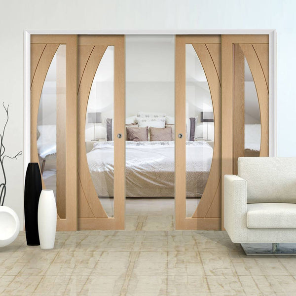 Salerno Oak Veneer Staffetta Quad Telescopic Pocket Doors - Clear Glass