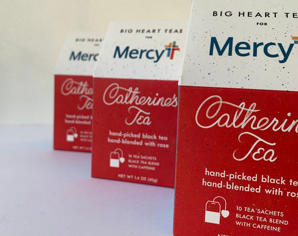 Boxes of "Catherine's Tea" black tea with rose for Mercy Health by Big Heart Tea Co.