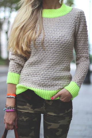 camo pants and neon sweater
