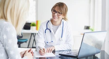 Female Doctor advising female patient 