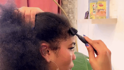 Brittany brushes her edges