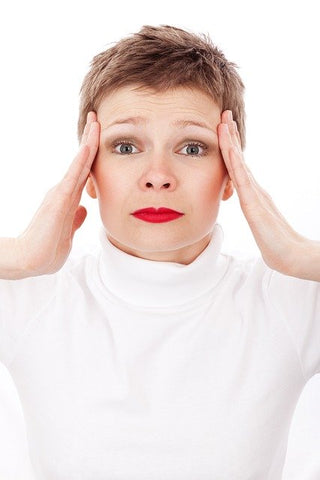 woman with migraine headache