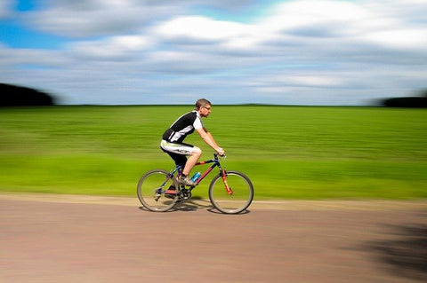 Cyclist in countryside