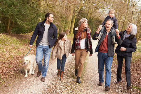 Family walking outdoors in fall