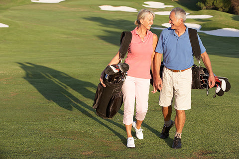 Couple golfing together