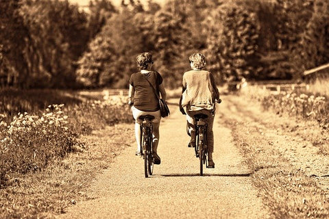 friends riding bikes together