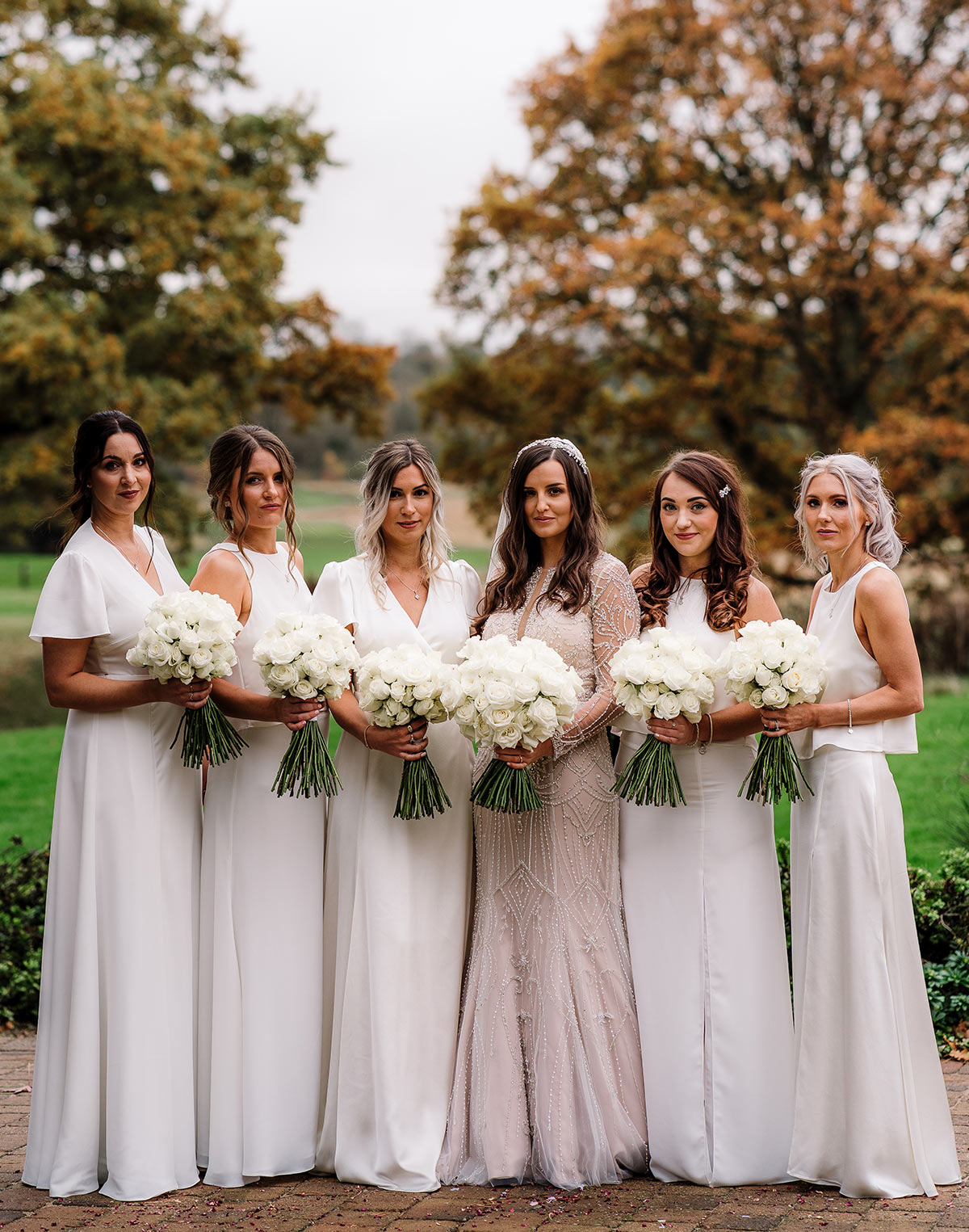 Ivory bridesmaid dresses with nude wedding dress