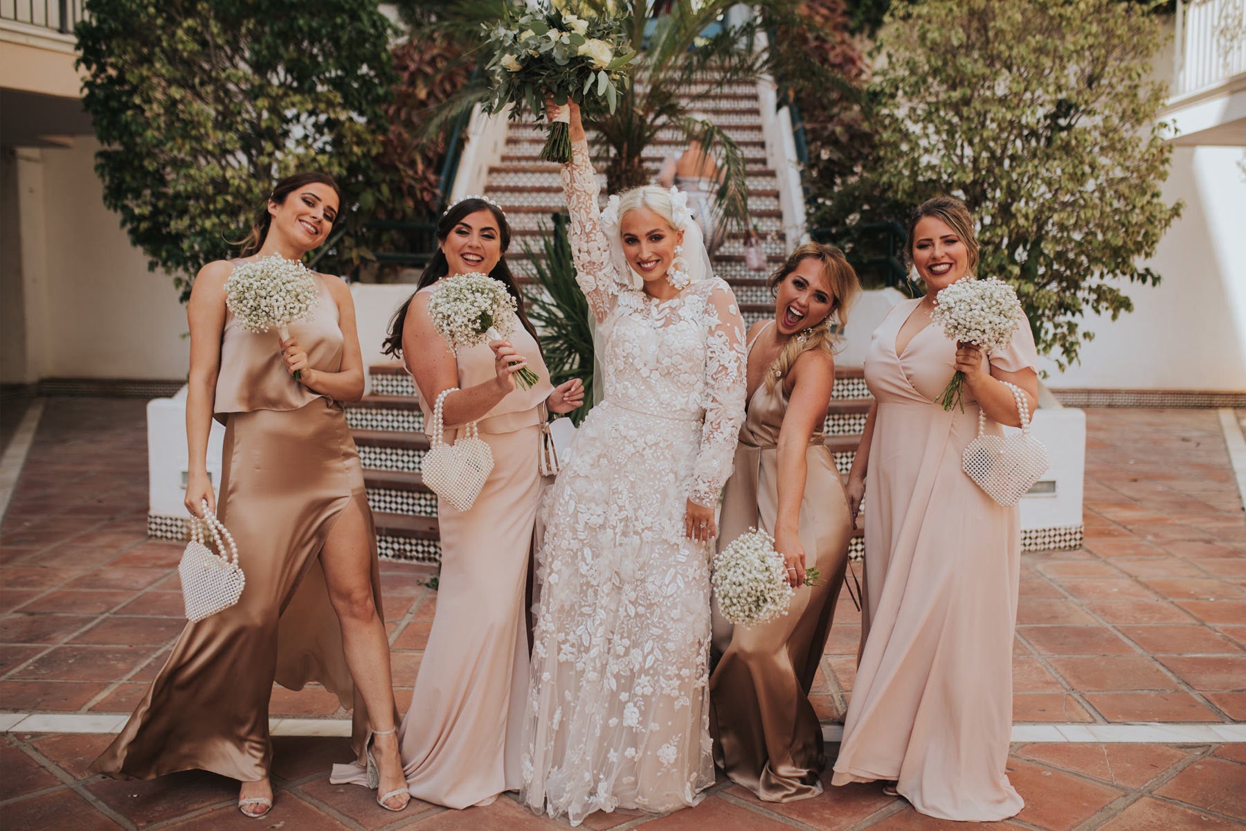 Mixing champagne silk and blush crepe bridemaid dresses can help give that elegant and sophisticated vibe to your wedding theme