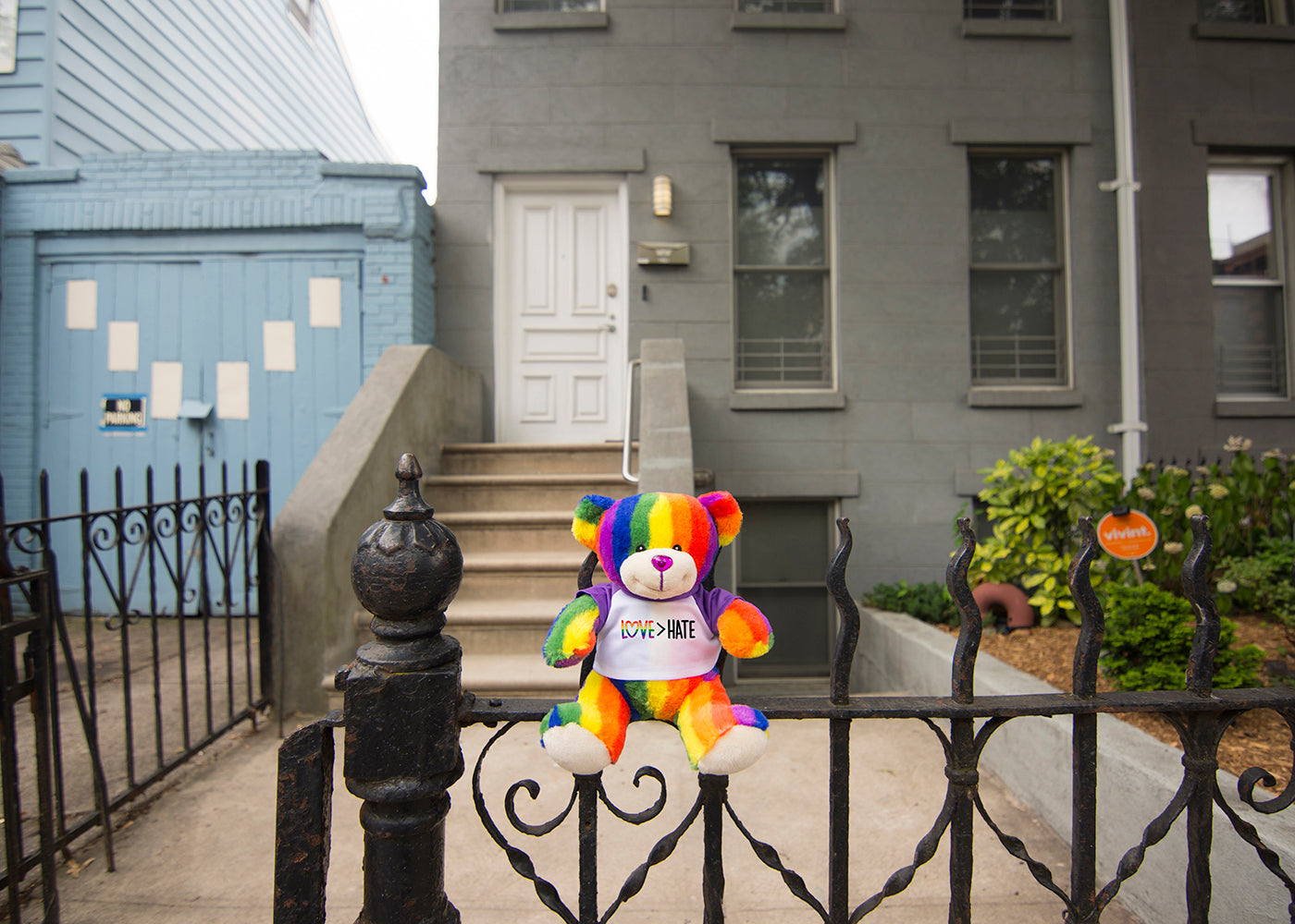 Bear Buggy®'s Totally Pride Teddy bear photographed in front of Brooklyn's Transy House for Pride, the home of trans activisit Sylvia Rivera