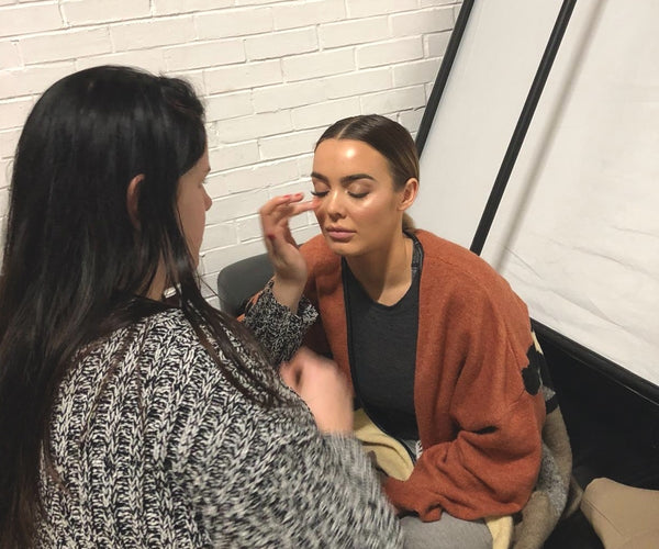 Rosie being prepared for the photoshoot with make-up artist