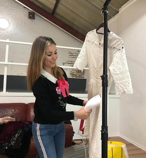 Youma Leth steaming the Athenes dress in the studio 
