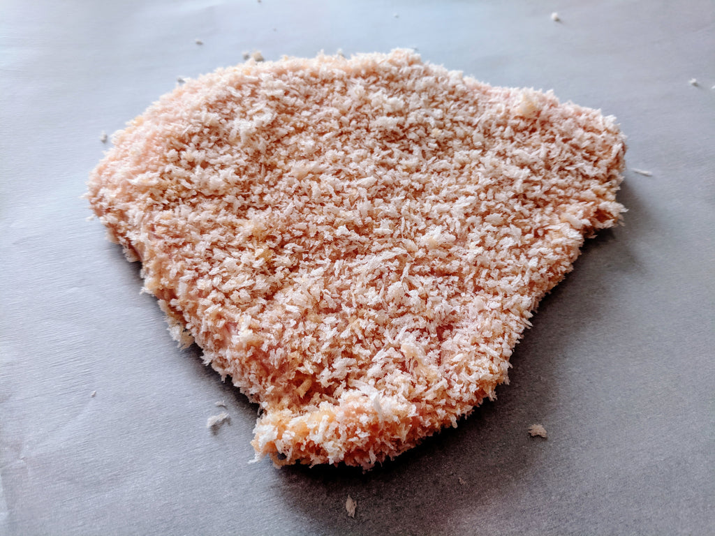 Pork floured, egg washed and dredged with panko