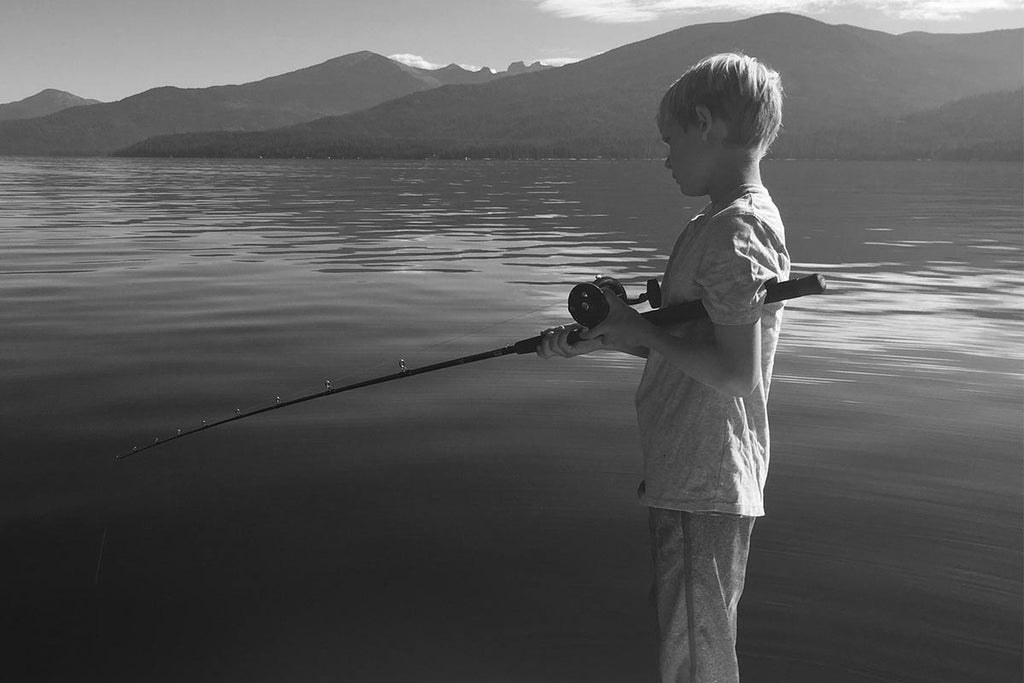 boy fishing for trout