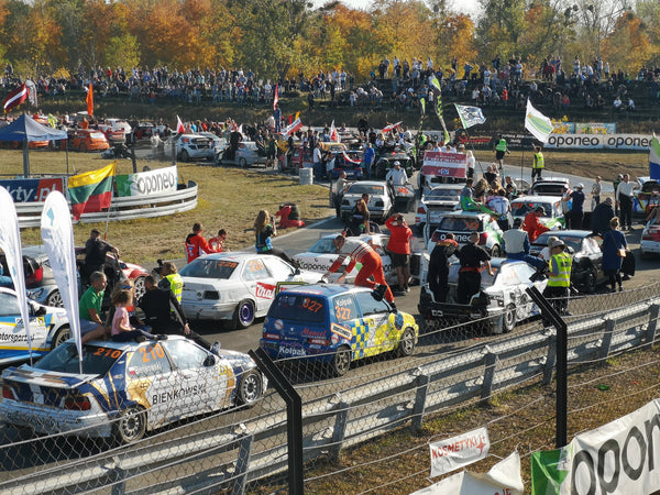 Crews and competitors parade the Torun RallyCross circuit in Poland