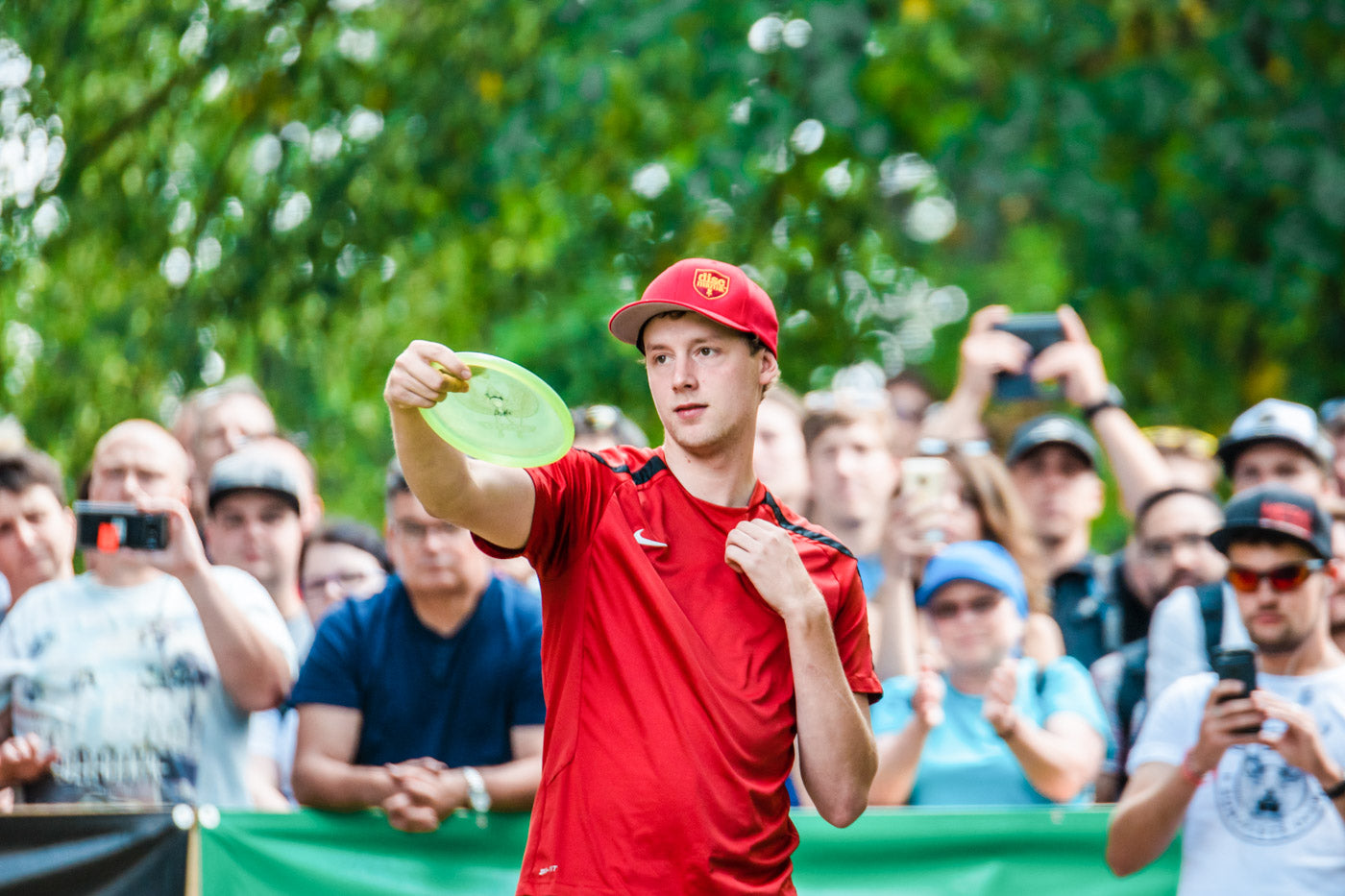 Simon Lizotte aims a shot with a putter