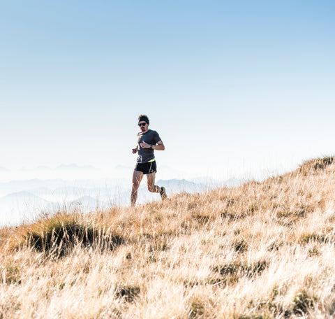 Man running in field