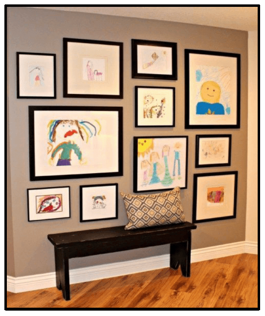 Framed childrens artwork for entryway