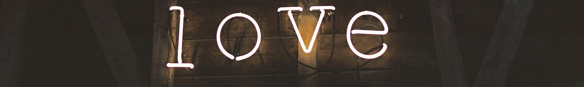 condoms sign love in neon letters