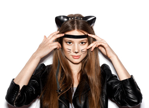 Cat halloween costume. Woman dressed in cat costume