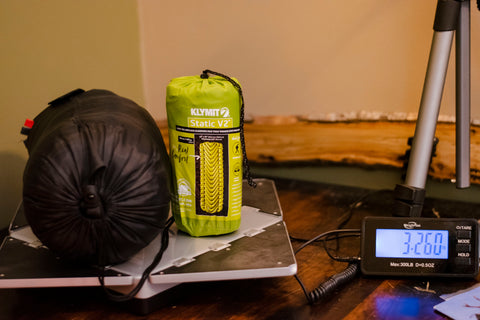 klymit and sleeping bag on scale