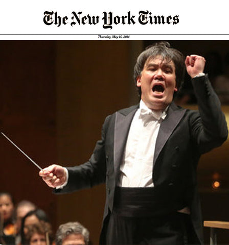 Alan Gilbert wearing custom Mimi Fong bow tie and custom Saint Laurie tuxedo as he leads the NY Philharmonic.