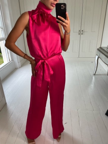 red jumpsuit with gold belt