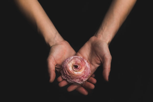 Holding a flower