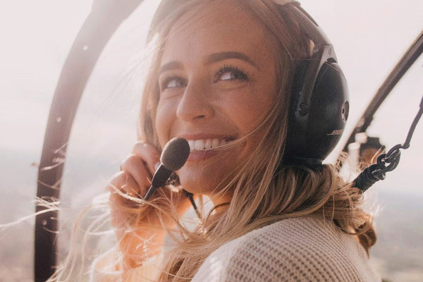 A happy girl in helicopter
