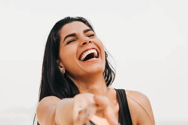 Laughing woman with smooth skin