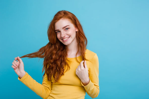 Girl with wavy red hair
