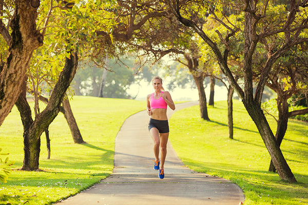 Woman jogging on pathway
