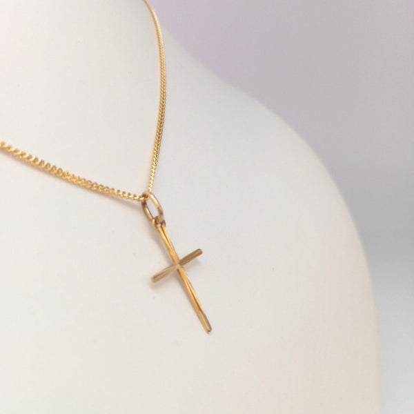 thin gold cross pendant