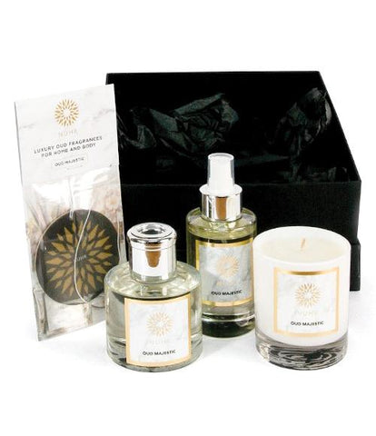 Rose and Oud complete gift set with black gift box to the back 