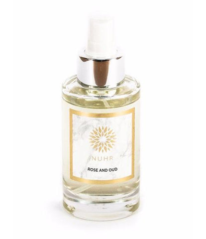 Rose and Oud home spray on white background