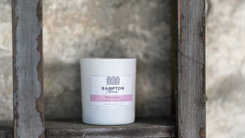 Primrose Lane candle on a wall aromatherapy and soy wax