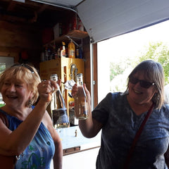 La Vida Local food and wine tour guests toast new-found friends at Farmgate Cider