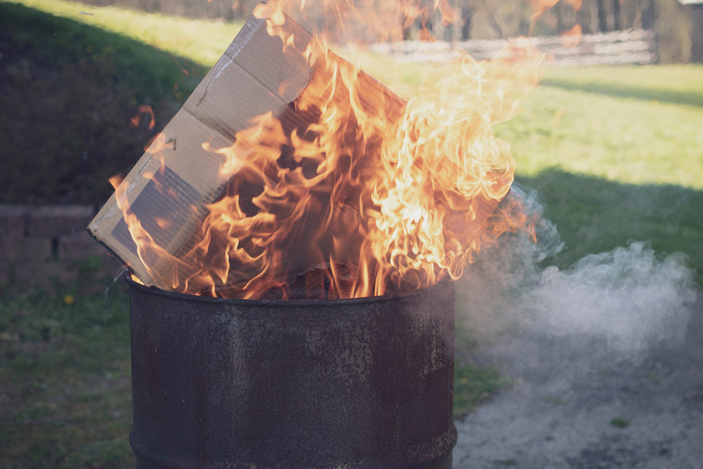 box burning in barrel