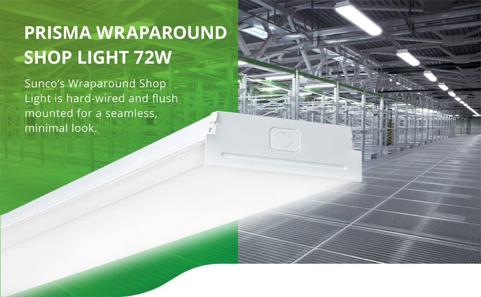 The 72W Sunco Prisma Wraparound Shop Light with prismatic lens and a wide, 11-inch width, is hard wired and flush mounted for a seamless, minimalist look. Image shows the 11-inch Prisma Wraparound LED Shop Light linked overhead in an industrial space. Wet rated, this shop light is ideal for parking lots, conference rooms, hallways, storage units, schools, hospitals, science laboratories, and offices.