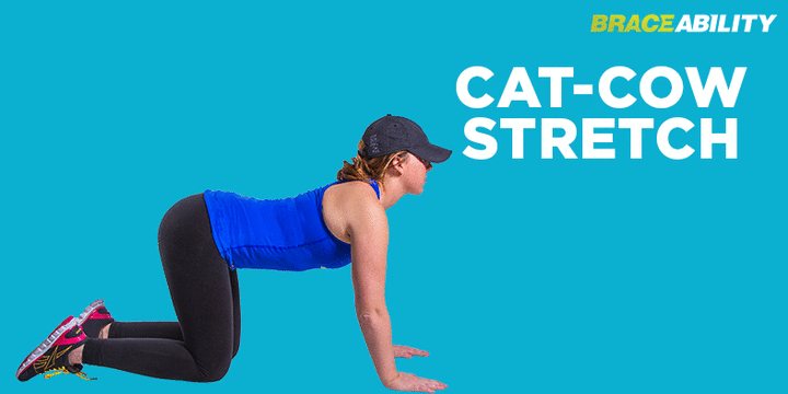 cat-cow yoga pose to relieve back pain from a strained or pulled back muscle