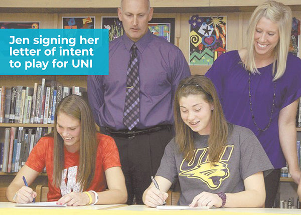high school athlete signing letter of intent to play basketball