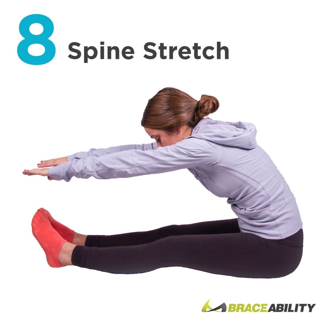 grab your toes to stretch your spine to fix your posture